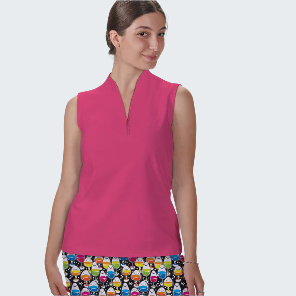 Woman wearing a pink sleeveless top with a colorful skirt on a white background