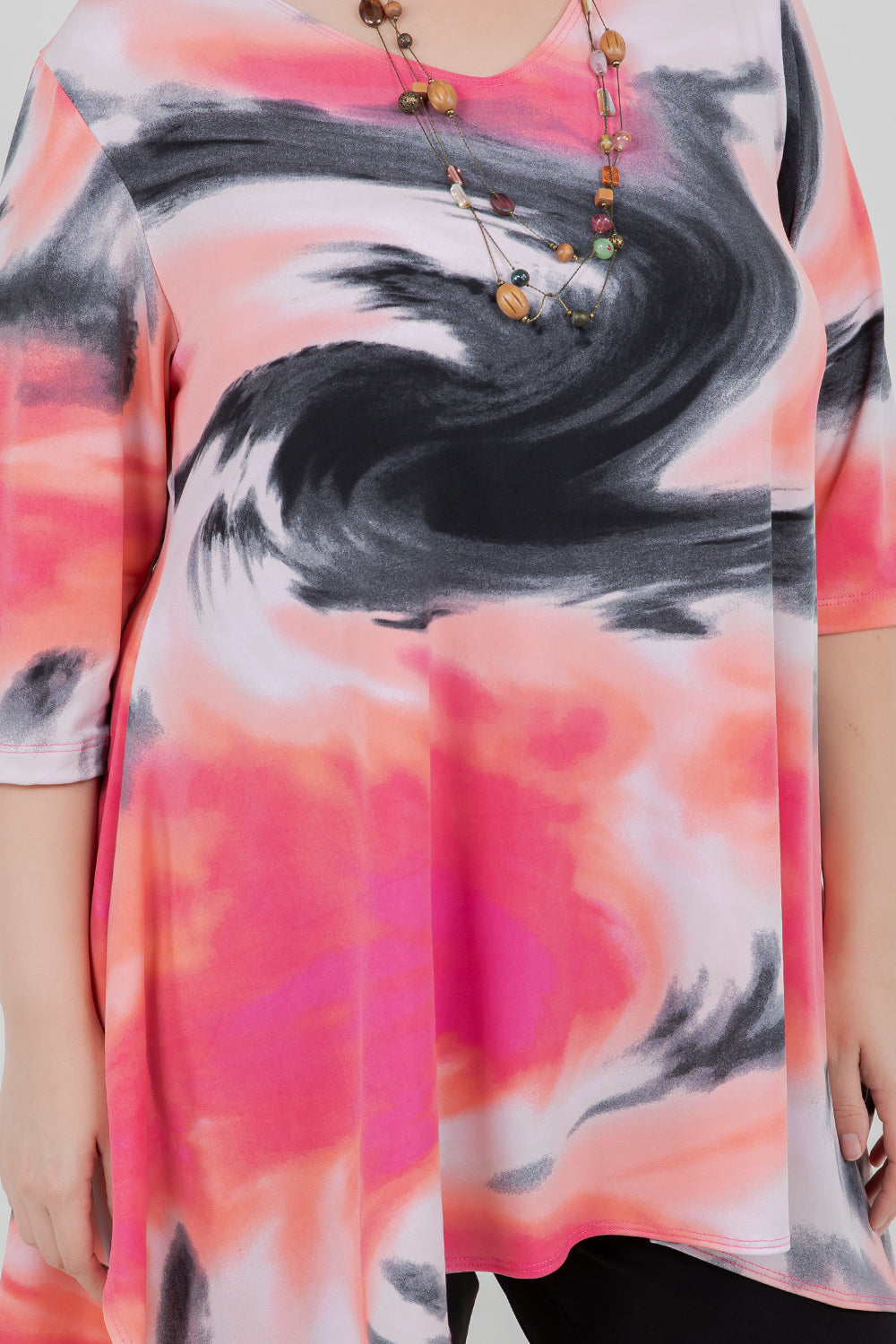 Colorful abstract patterned dress with a focus on the design.