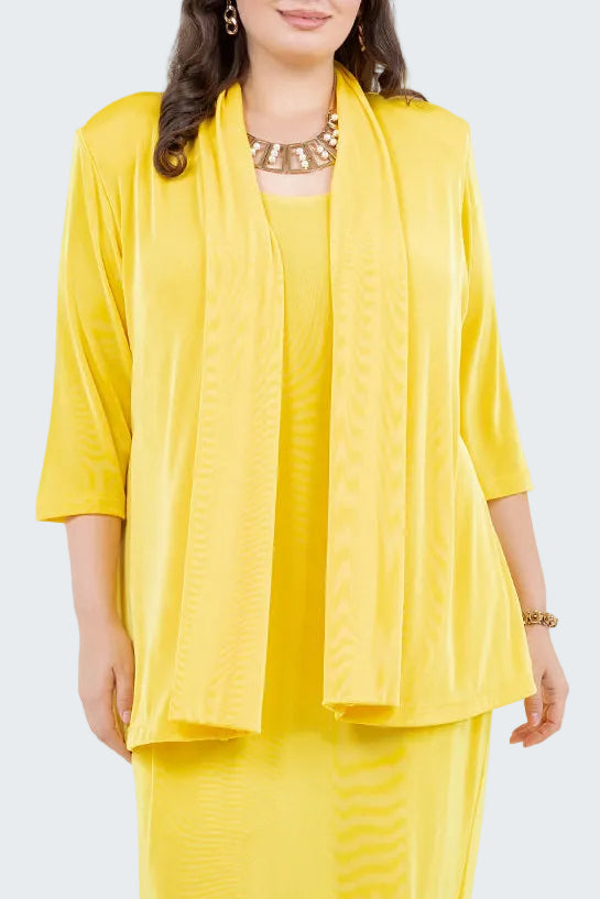 Woman wearing a yellow outfit with a matching jacket on a white background