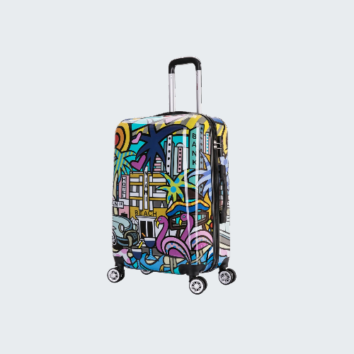 Colorful suitcase with abstract design on a white background