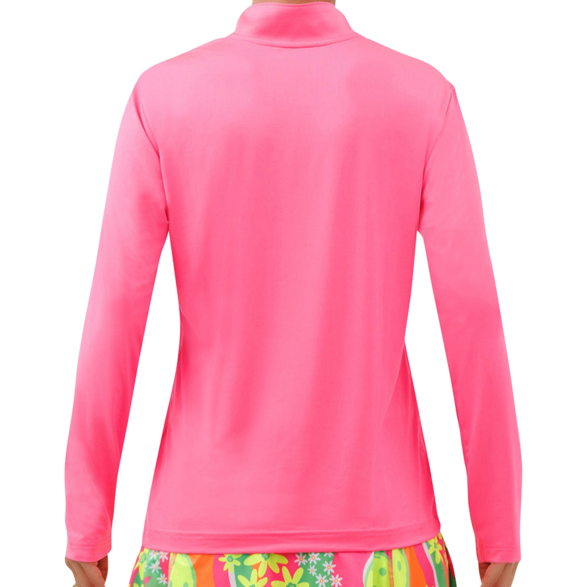 Pink long-sleeve top worn by a person with colorful shorts on a white background