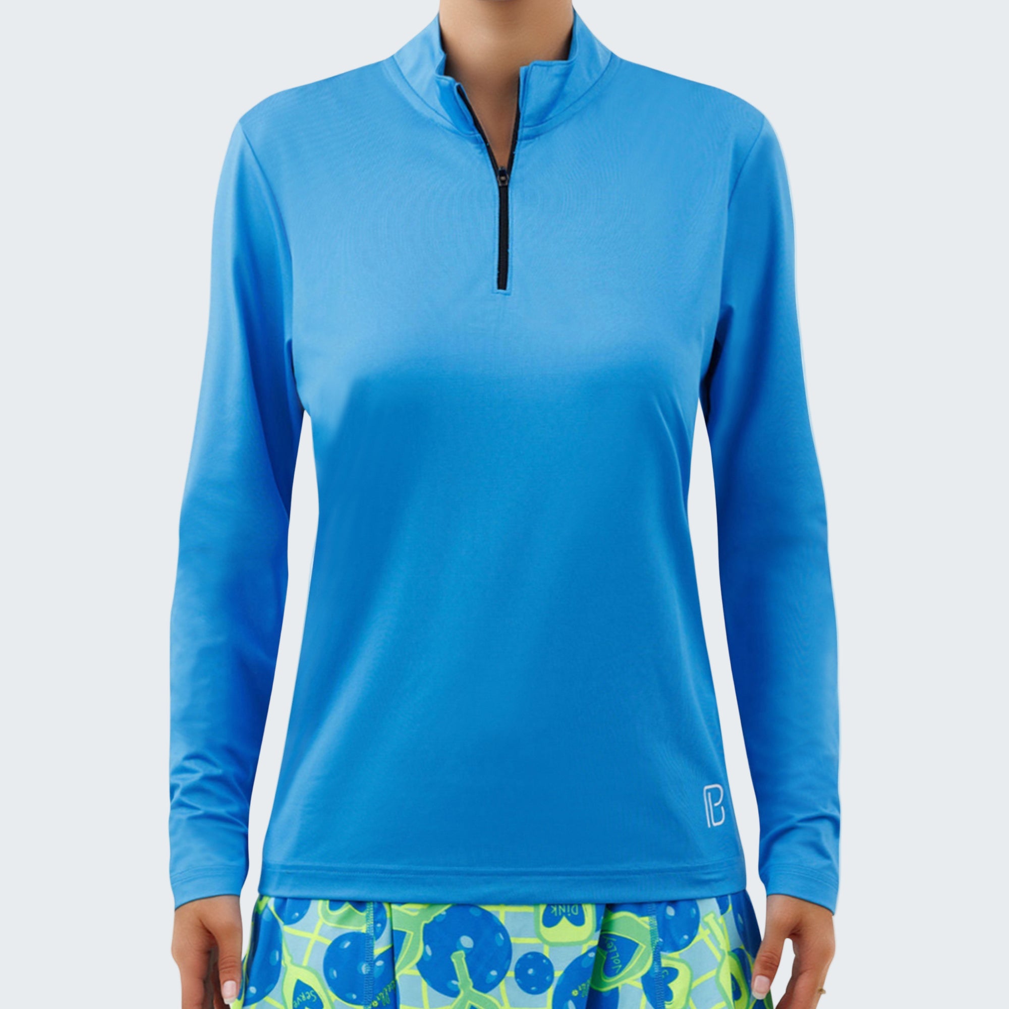 Blue long-sleeve athletic top with a brand logo on a white background