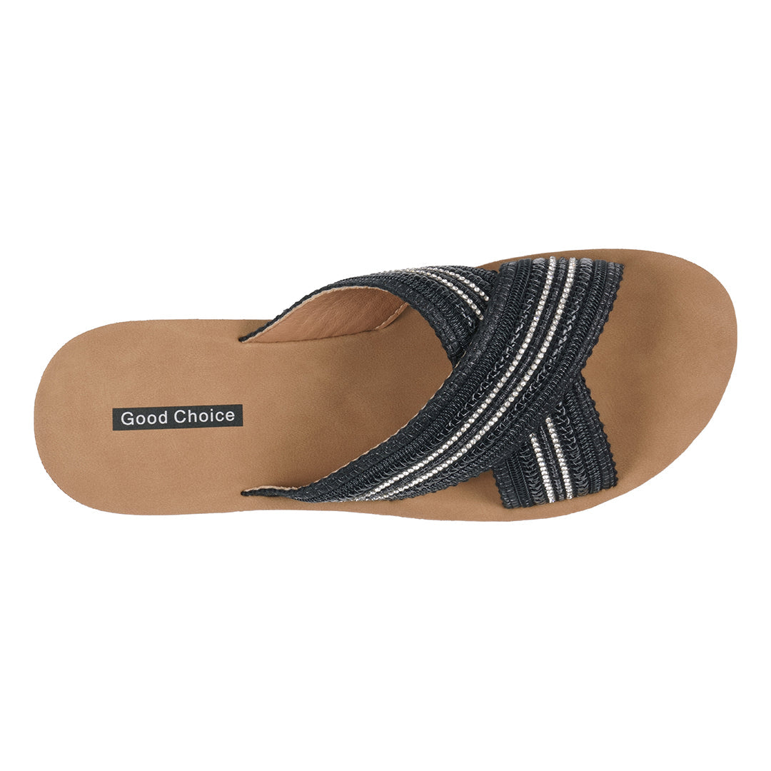 Black sandal with striped design on a white background