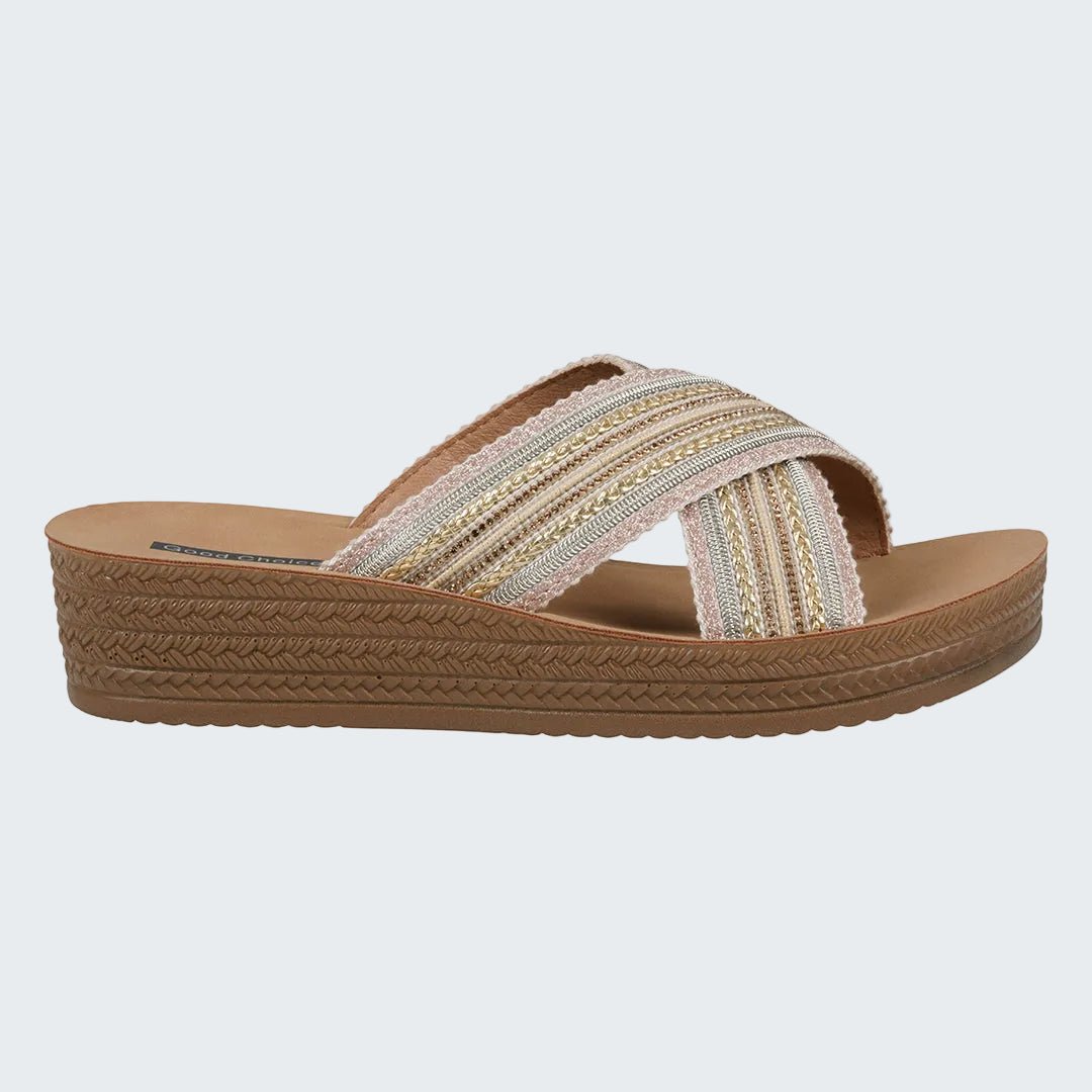 Woven sandal with a brown sole on a white background