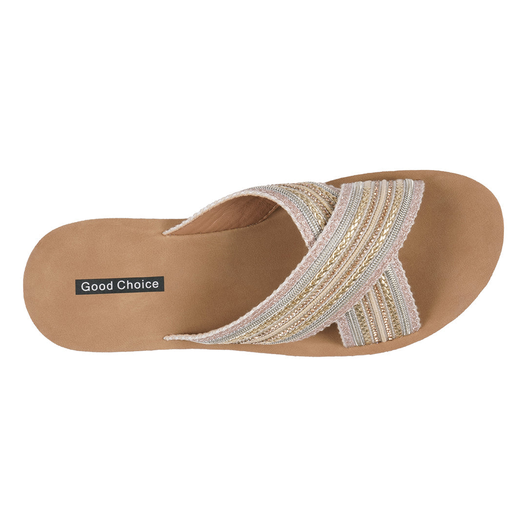 Beige sandal with decorative straps on a white background