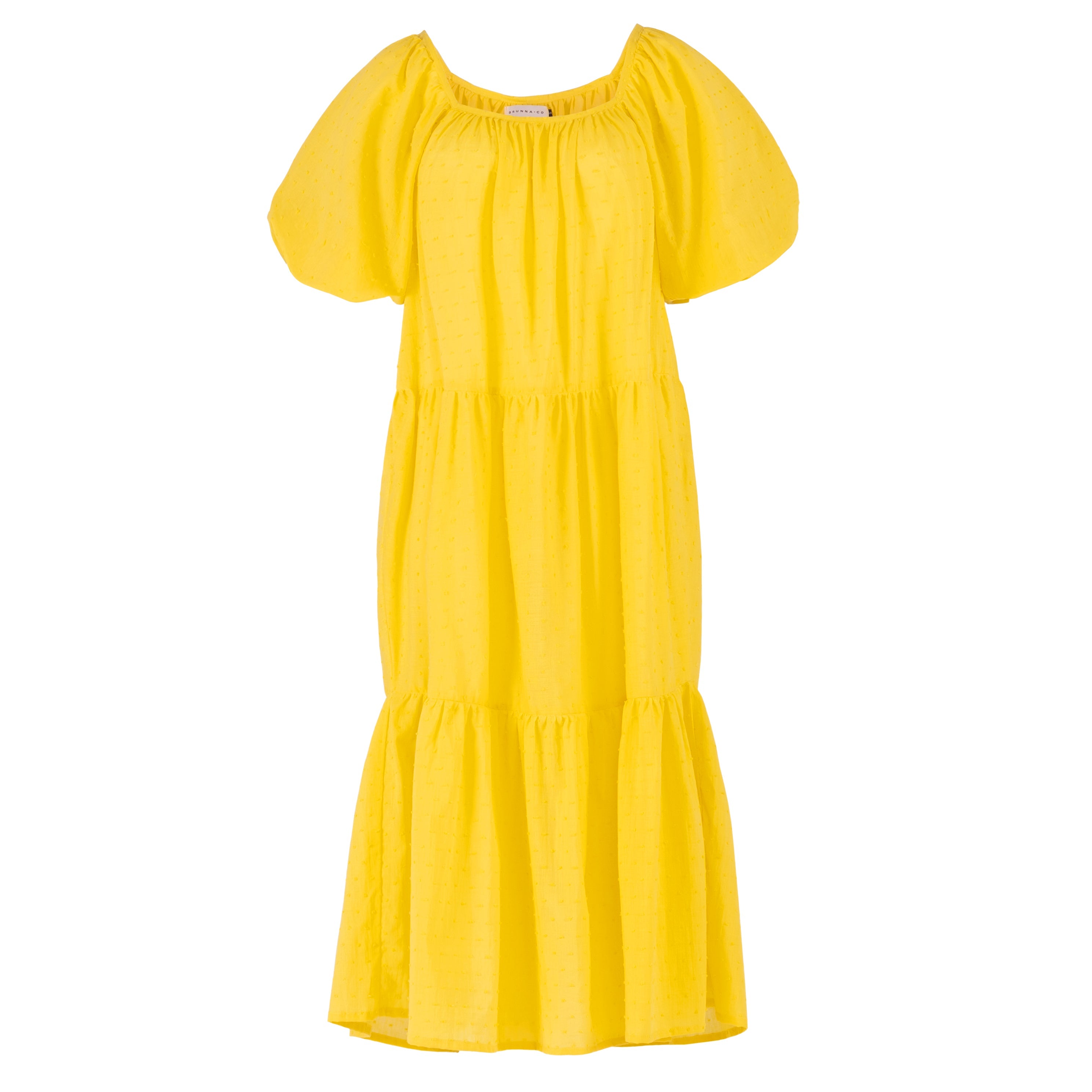Yellow dress with puff sleeves on a white background