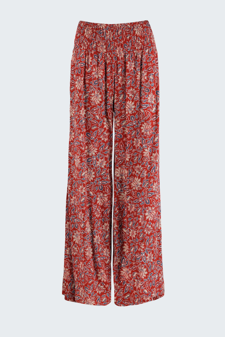 Red patterned pants on a white background