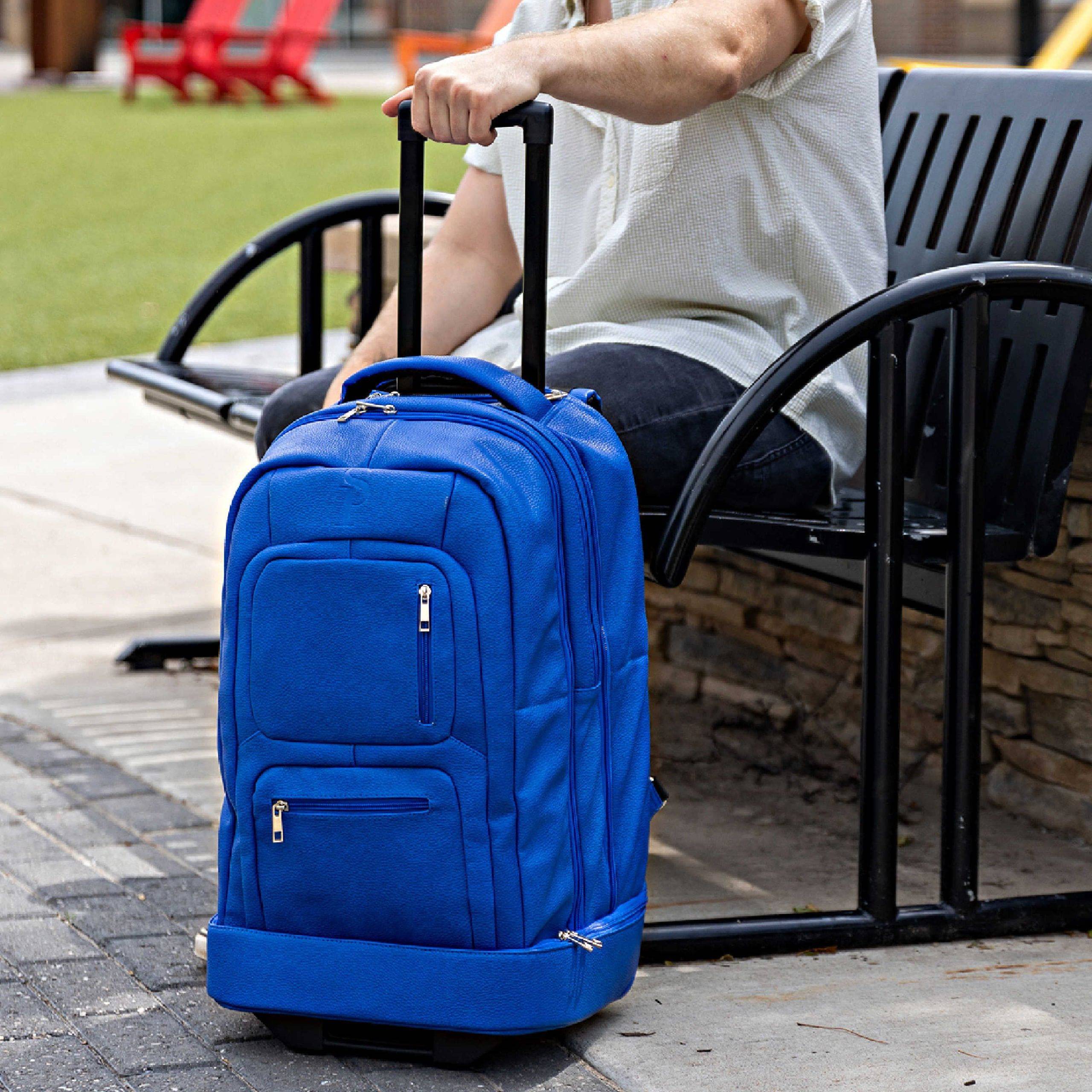 Blue backpack with wheels on a bench