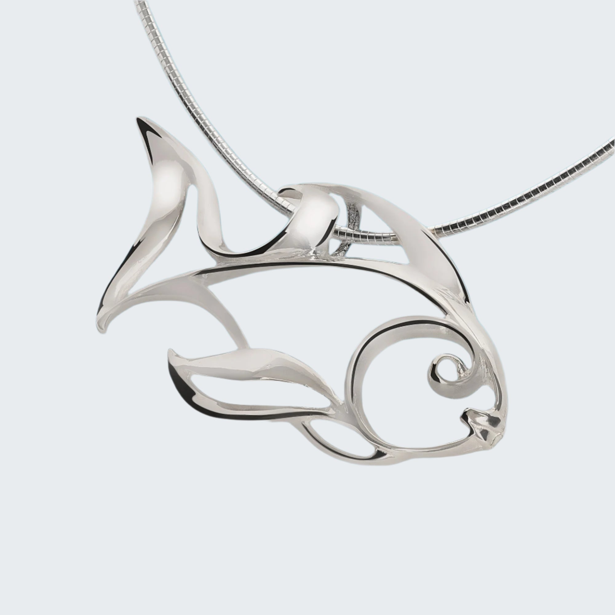 Silver anglefish pendant on a blue water background