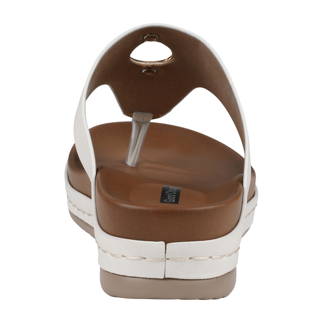 Brown and white sandal on a white background