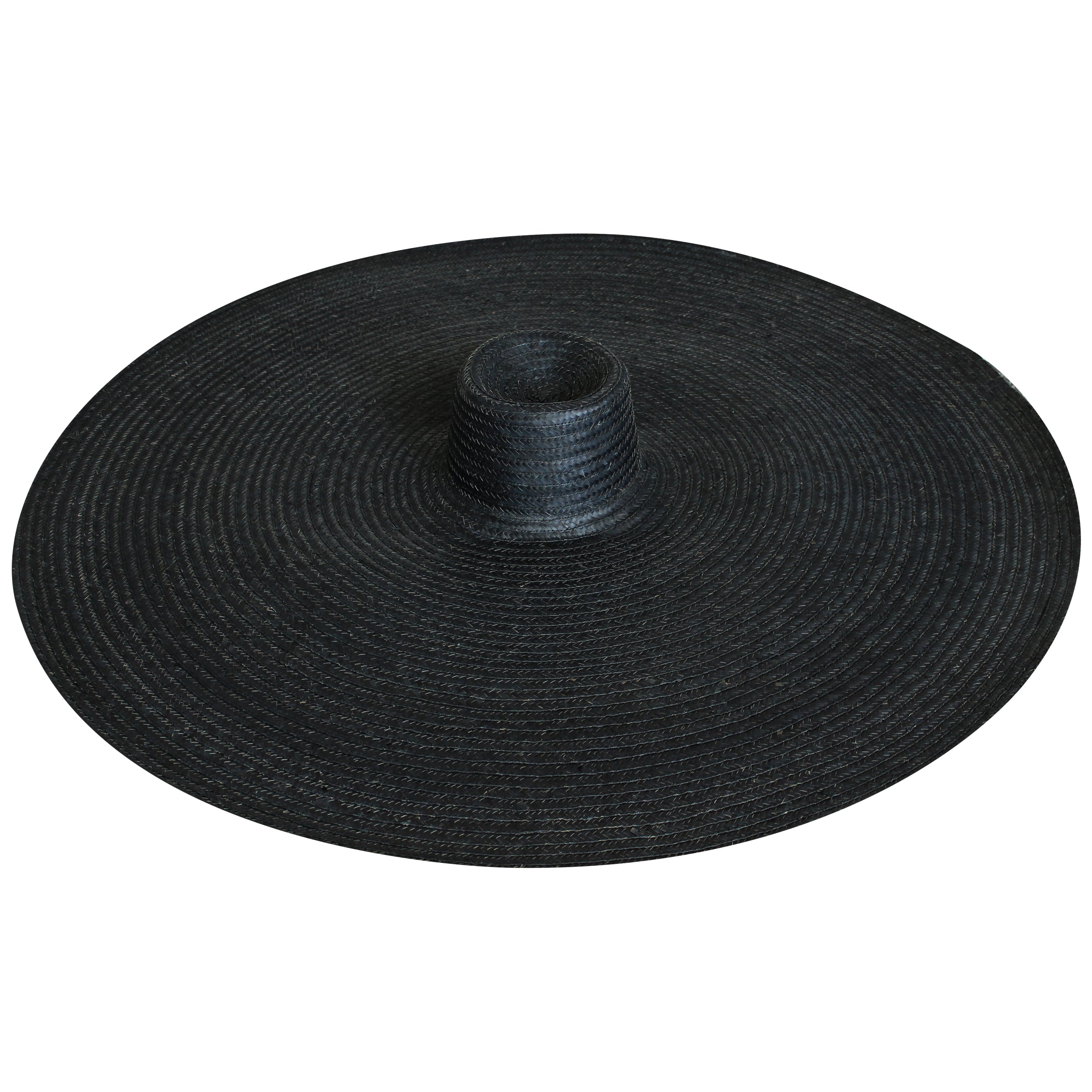 Black straw hat on a white background