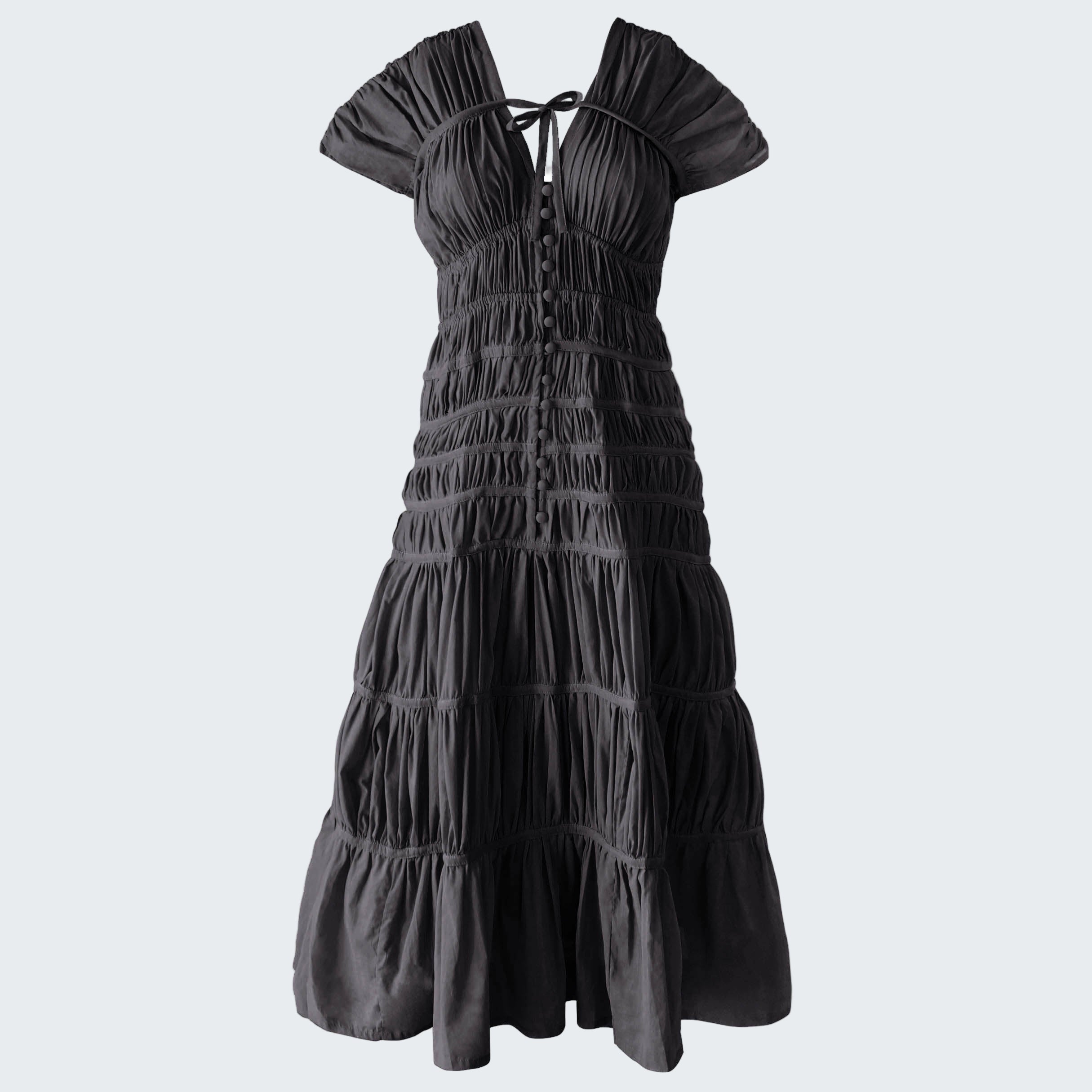 Black tiered dress on a white background