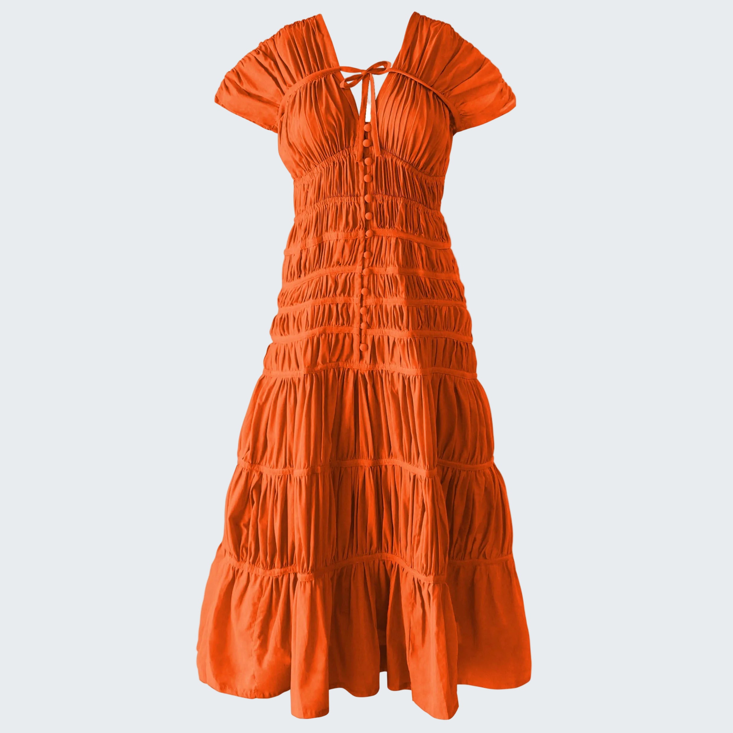Orange dress with ruffled layers on a white background