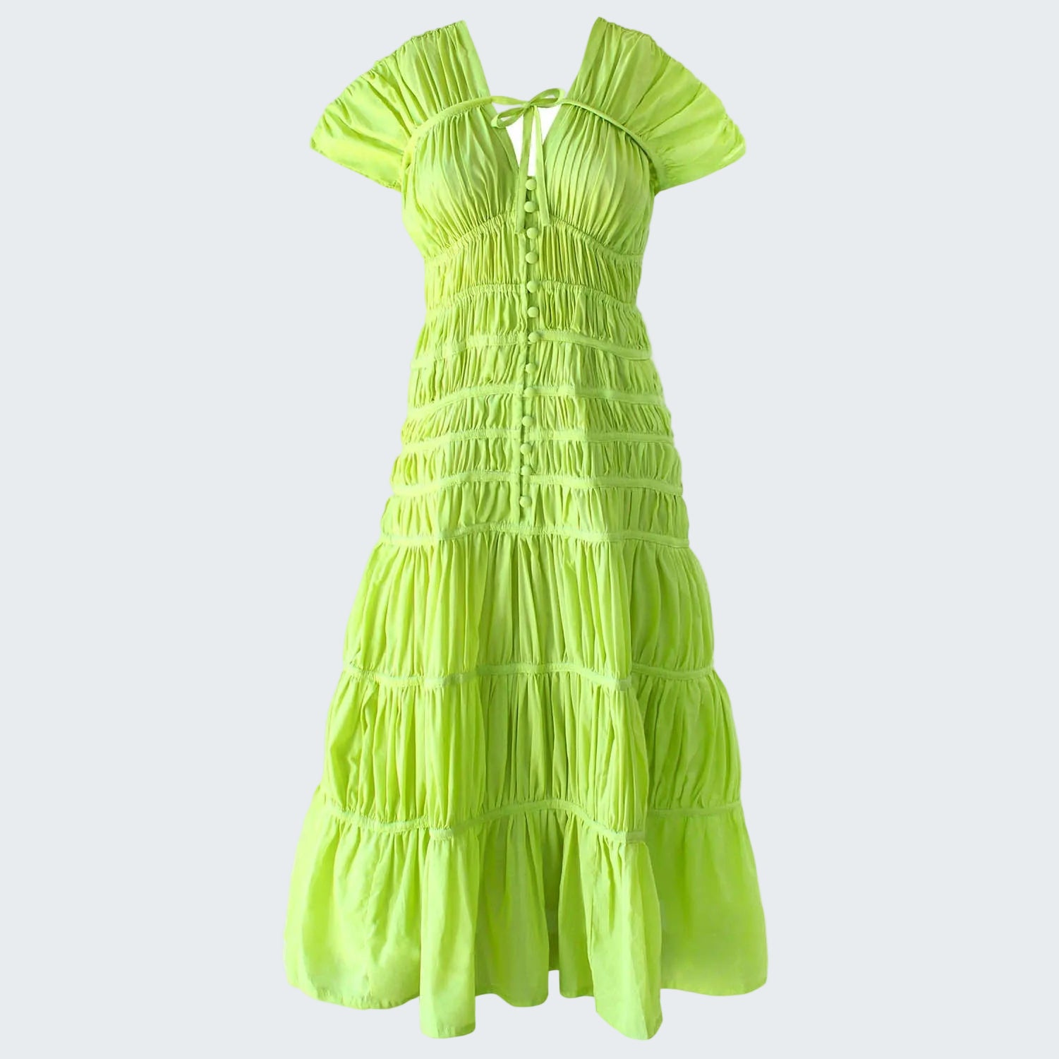 Neon green dress with ruffled layers on a white background