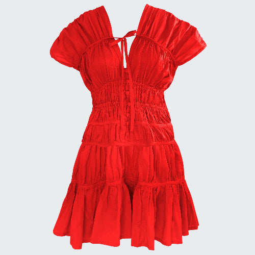 Red dress with ruffled layers on a white background
