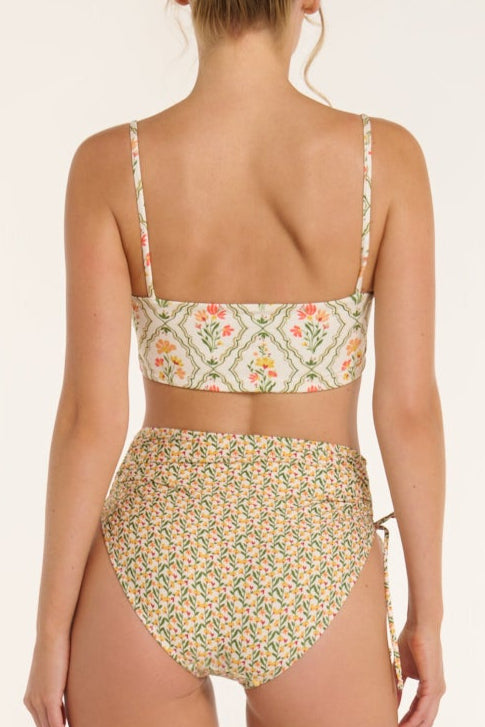 Floral bikini set on a plain background