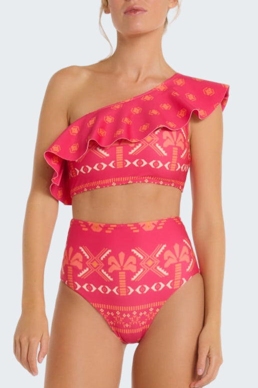 Pink bikini set with ruffled top on a white background