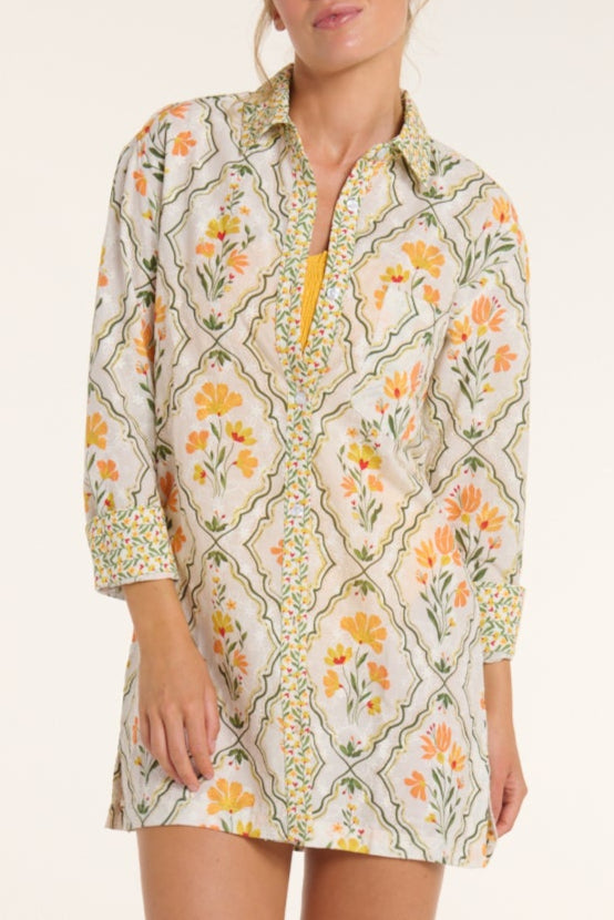 Floral patterned dress with a white background