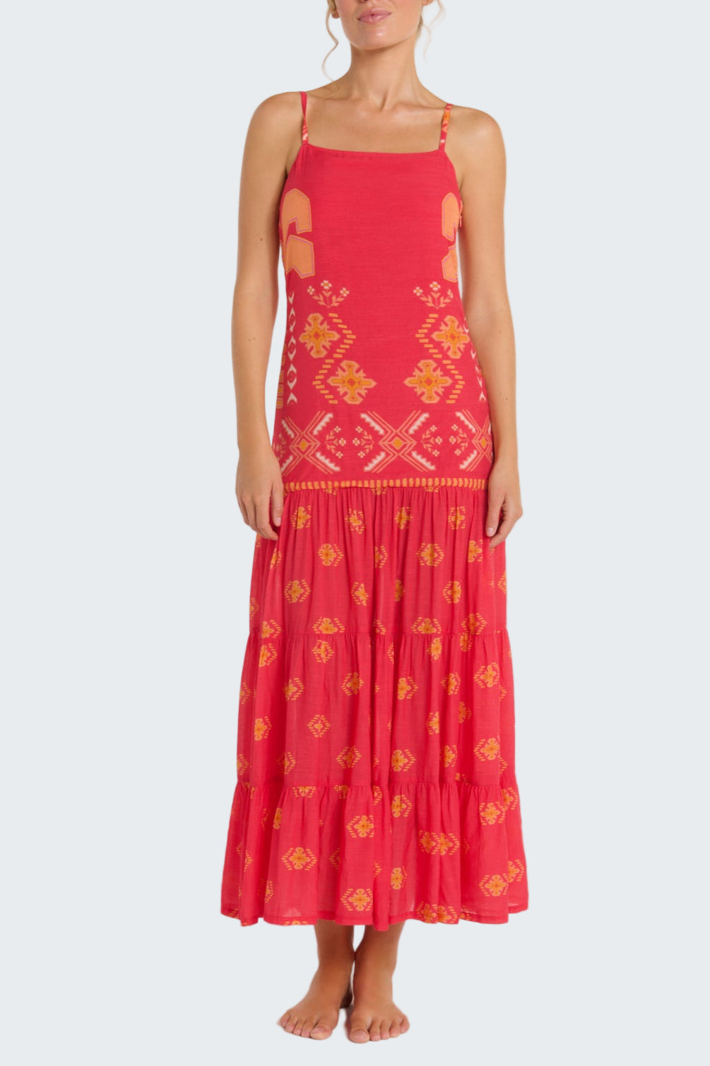 Red dress with yellow patterns on a white background