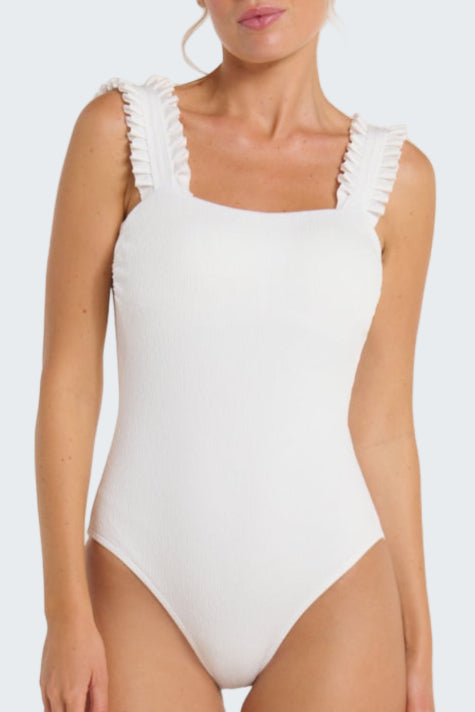 White one-piece swimsuit with ruffled straps on a white background