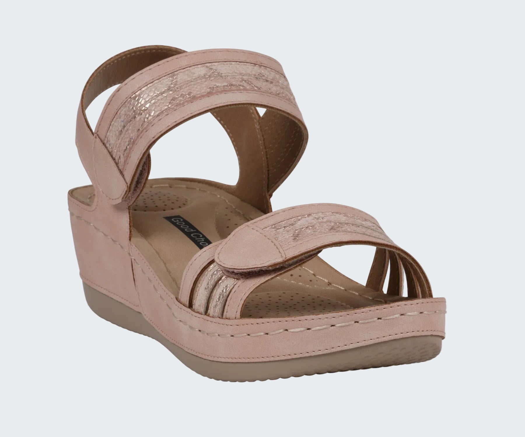 Pink wedge sandal on a white background