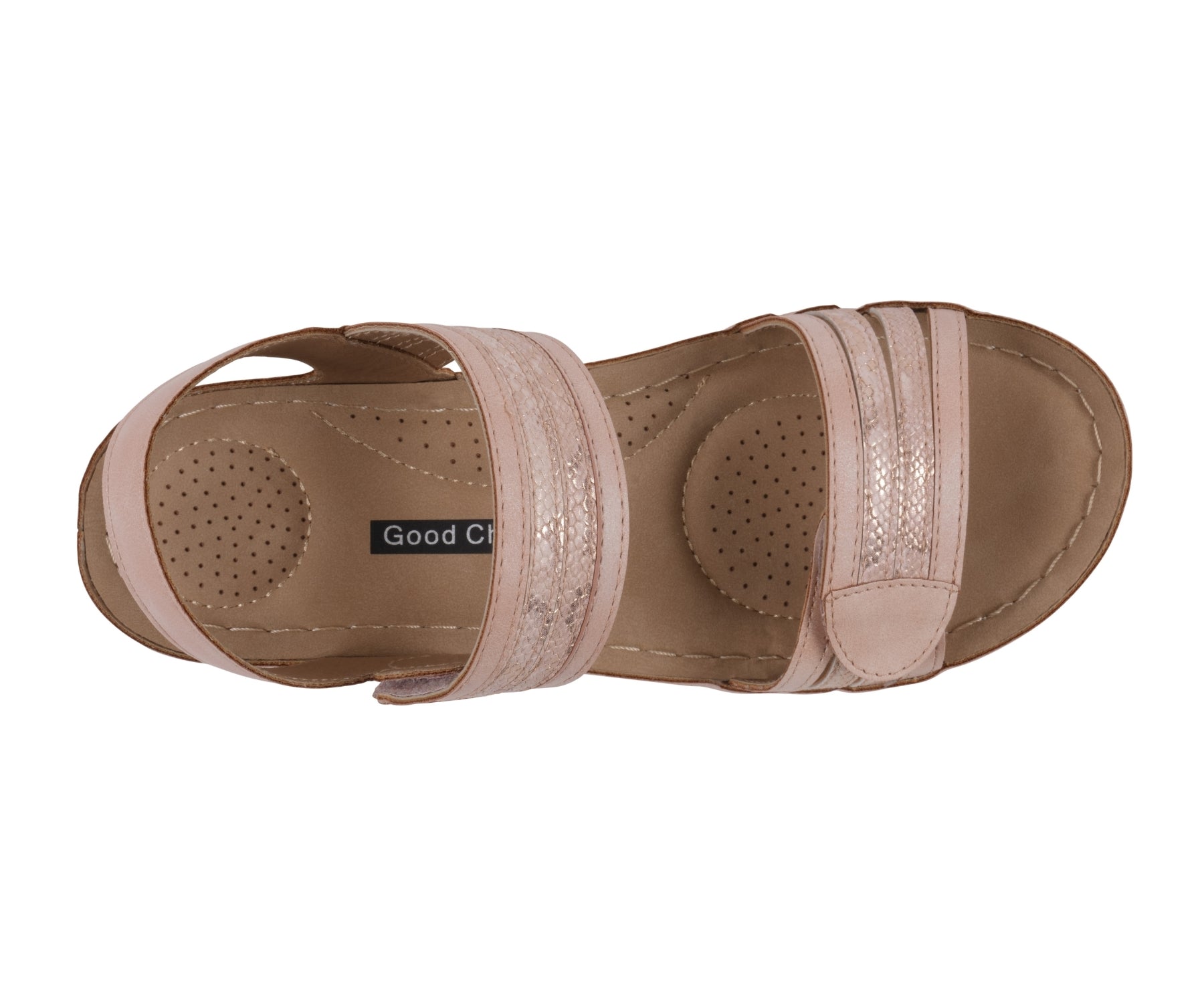 Tan sandal with pink straps on a white background
