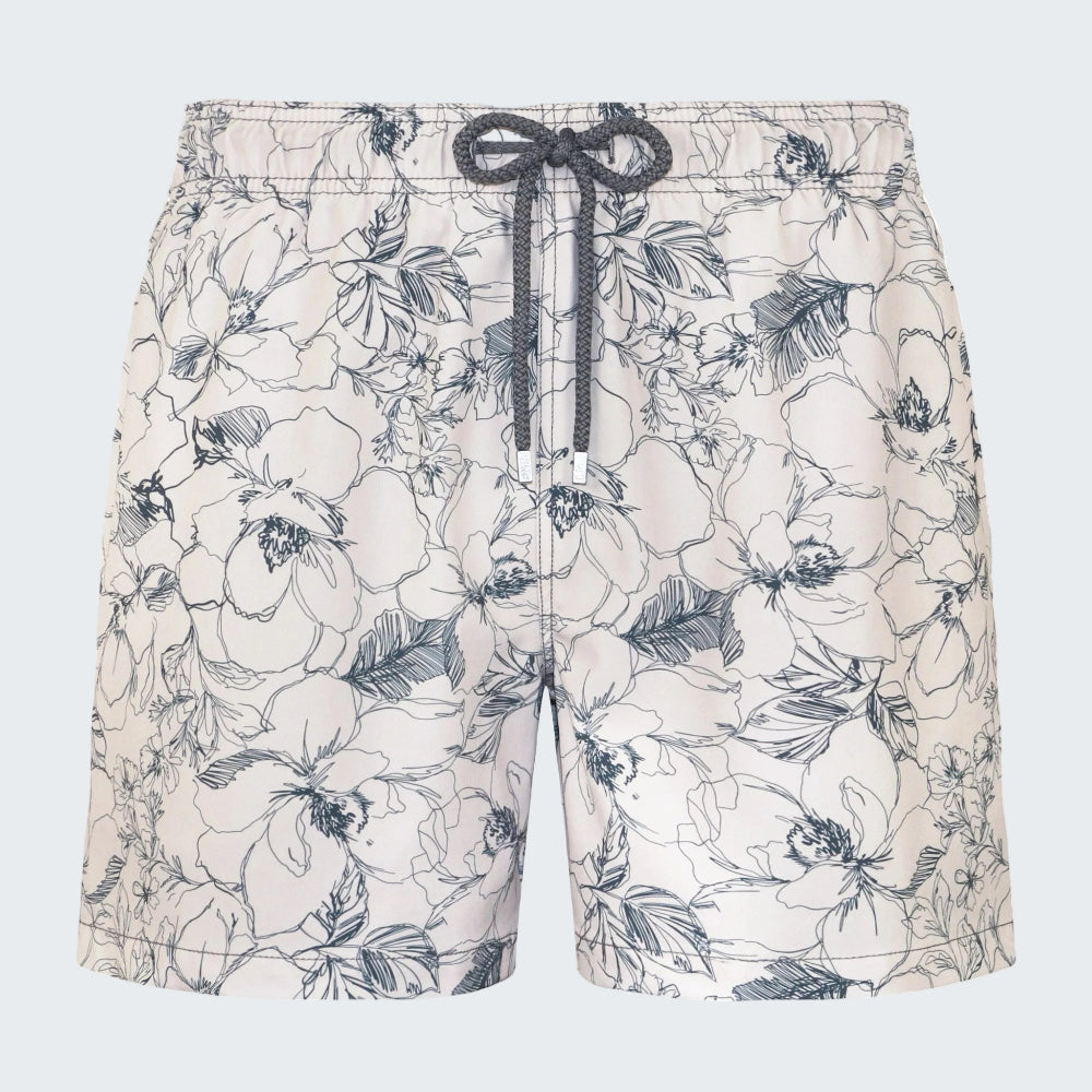 Floral patterned shorts with a drawstring on a white background