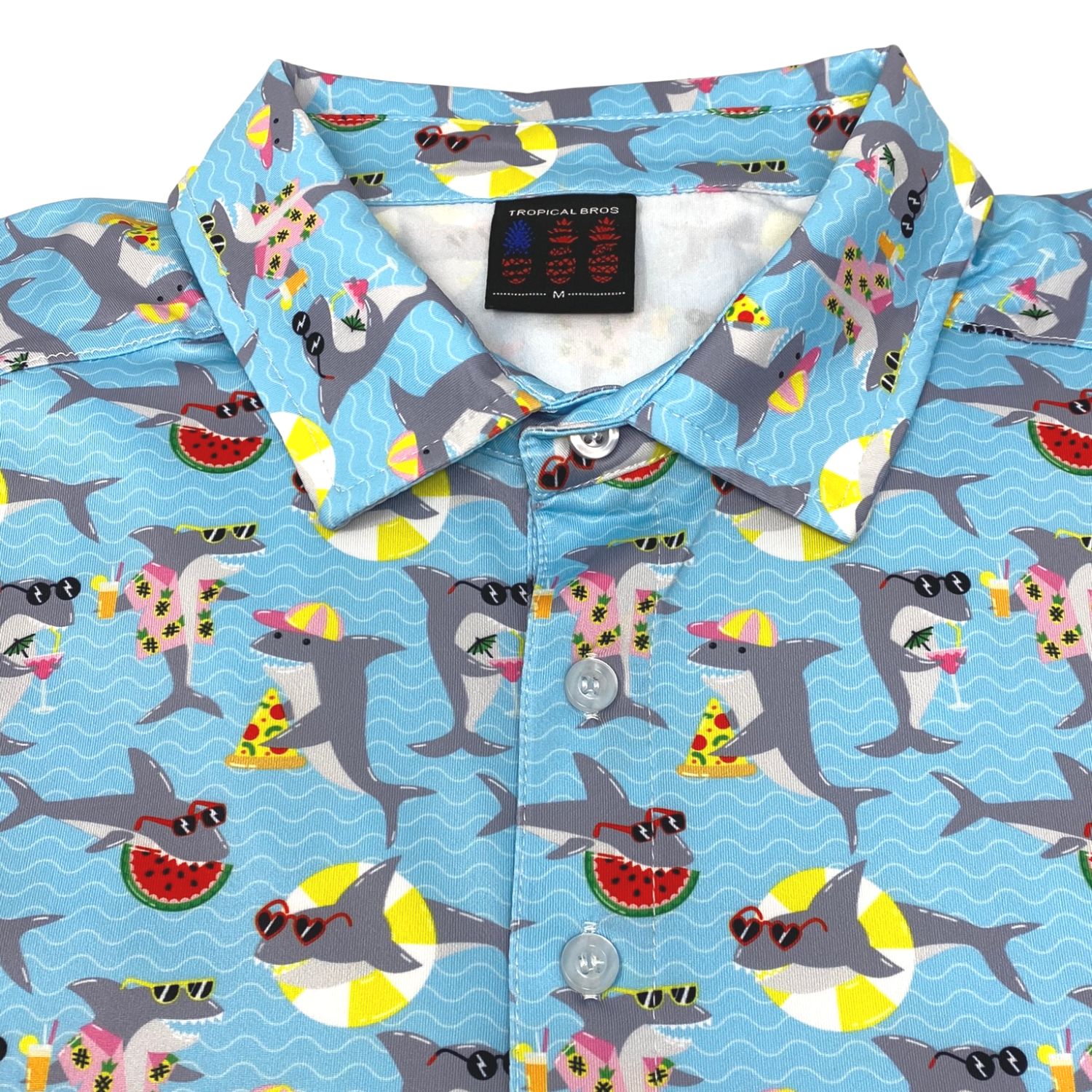 Shirt with a tropical shark pattern on a blue background