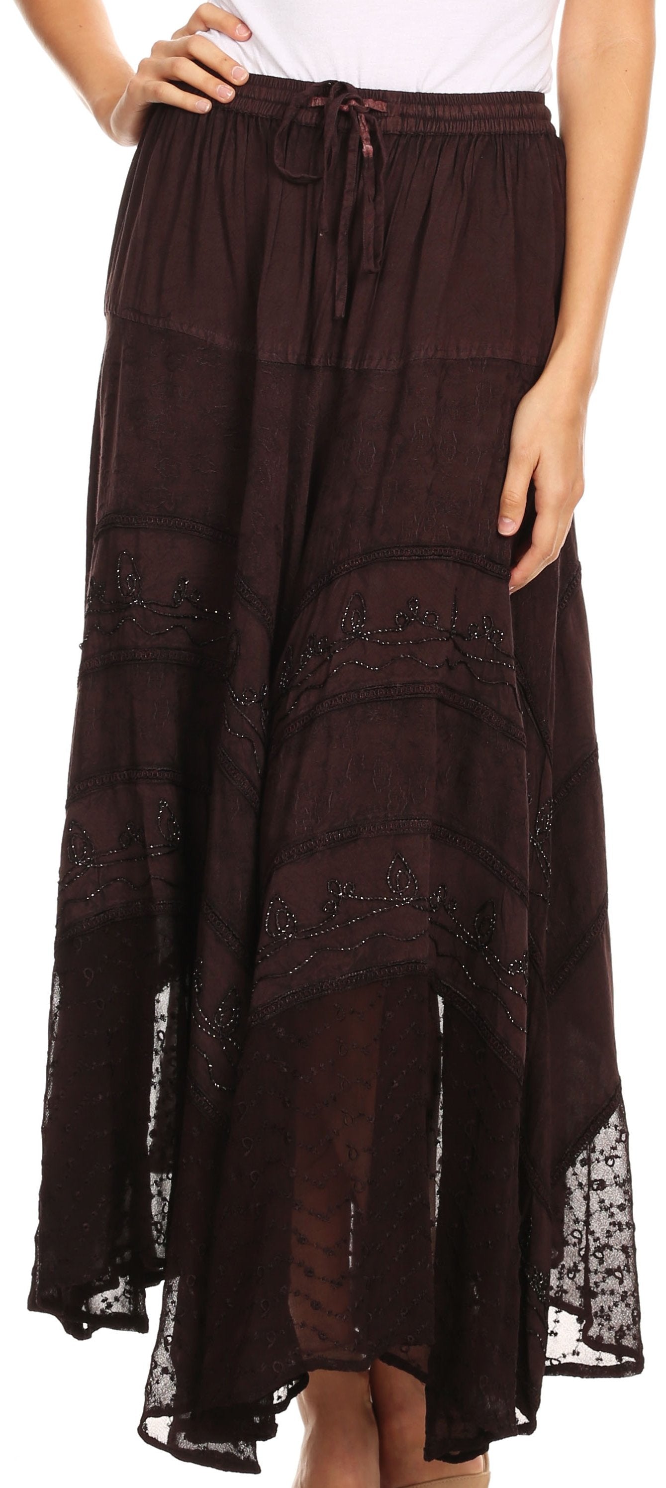 Brown long skirt with lace details worn by a person