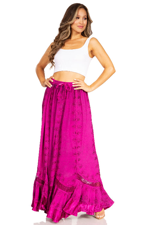 Woman wearing a white top and pink skirt on a white background