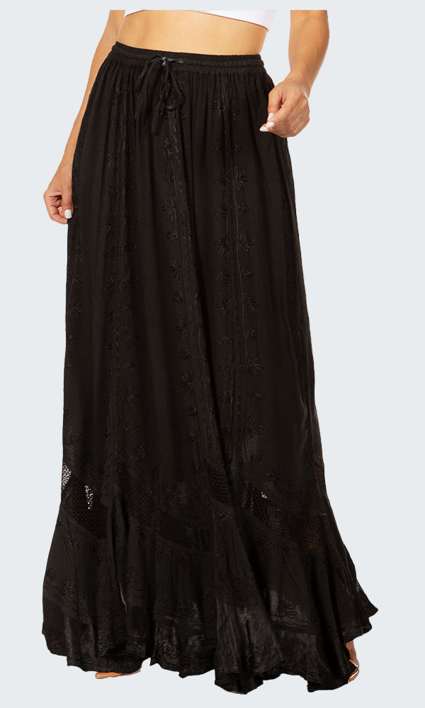 Black long skirt worn by a person on a white background