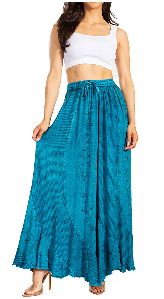 Woman wearing a blue skirt and white top on a white background