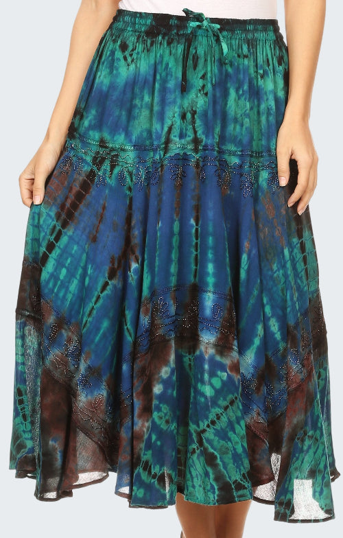 Tie-dye skirt with blue, green, and brown patterns on a white background