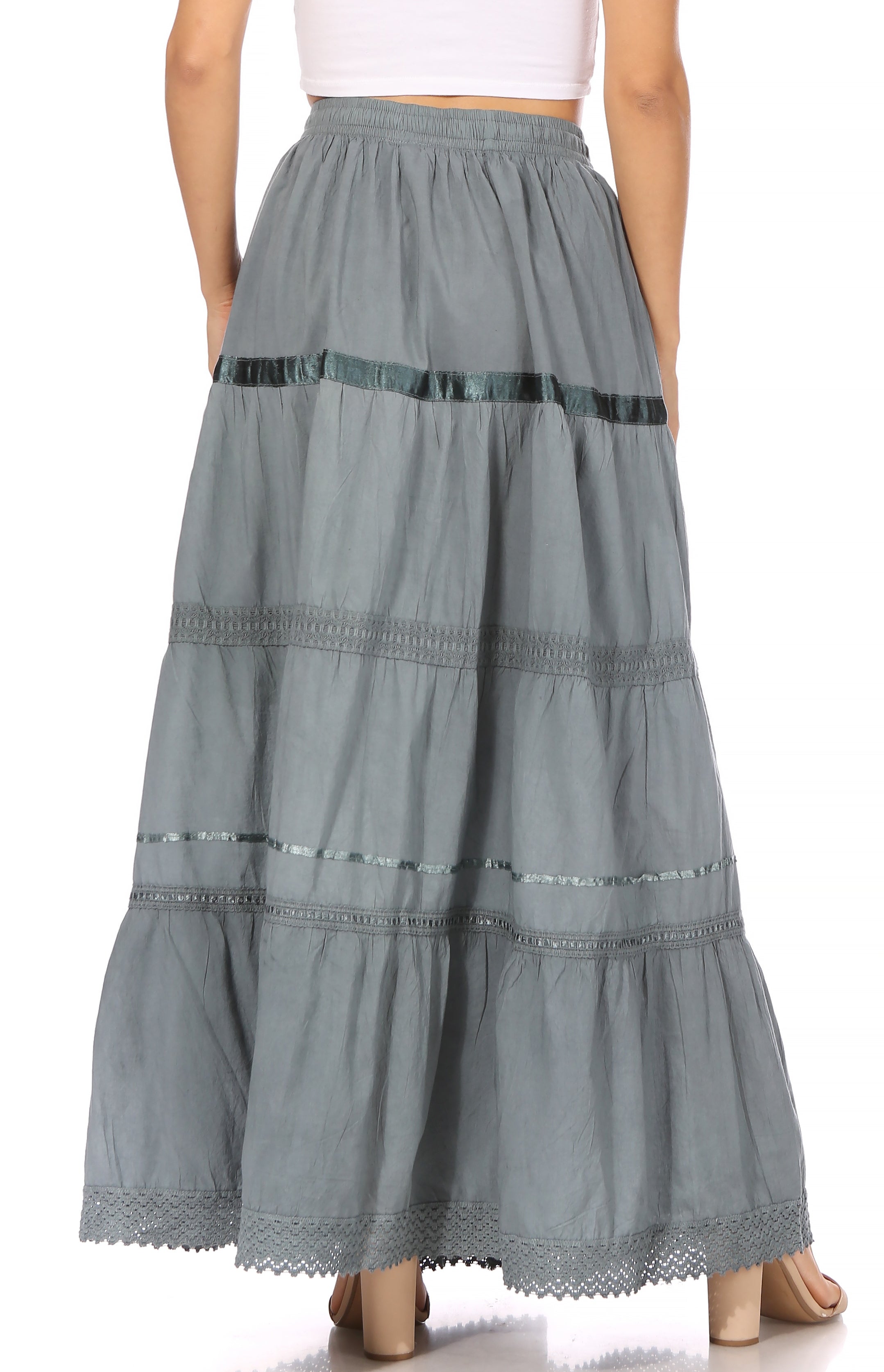 Long gray skirt with tiered design on a white background