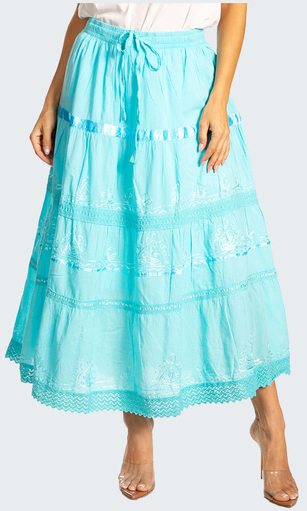 Light blue lace skirt worn by a person on a white background