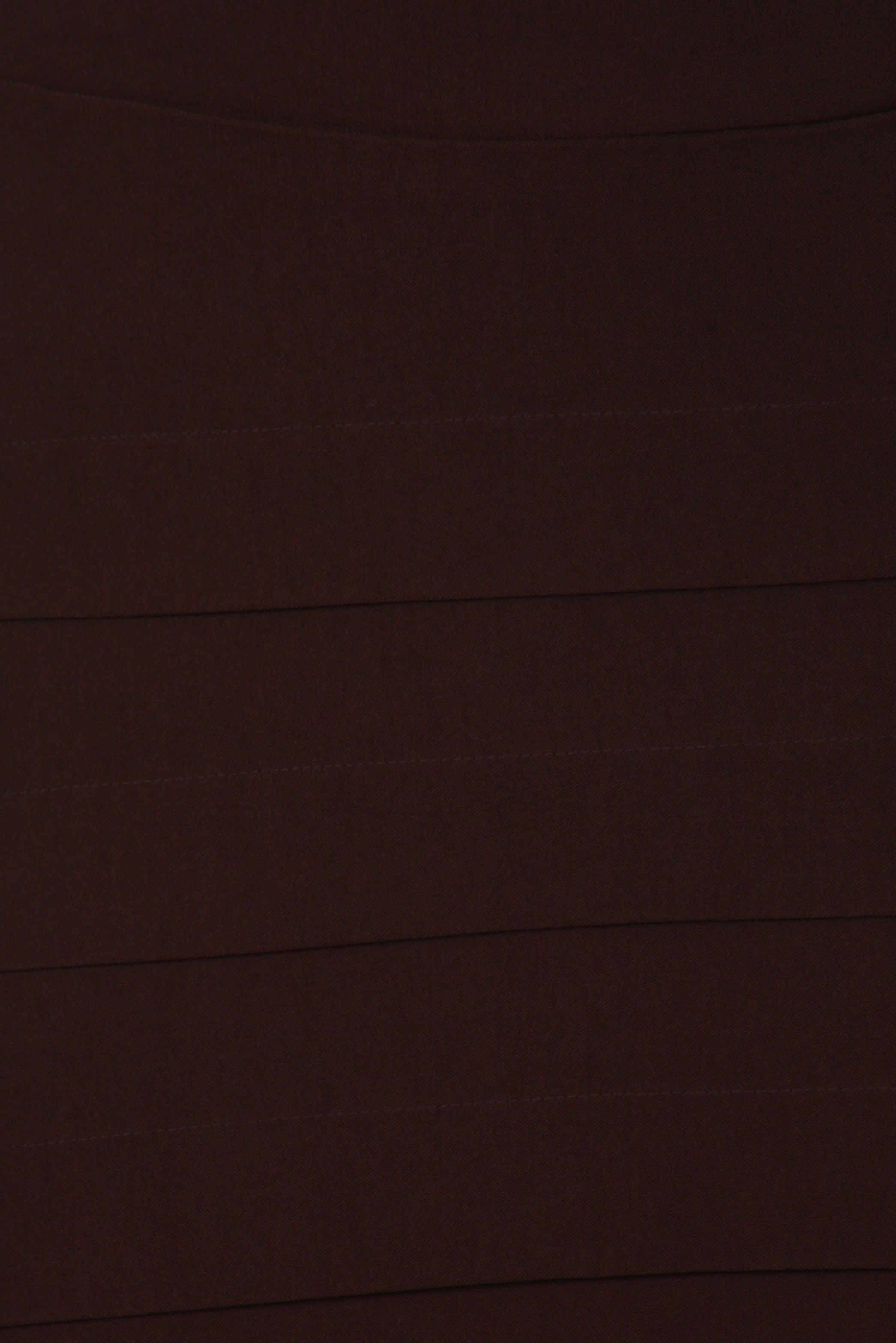 Close-up of dark brown fabric texture
