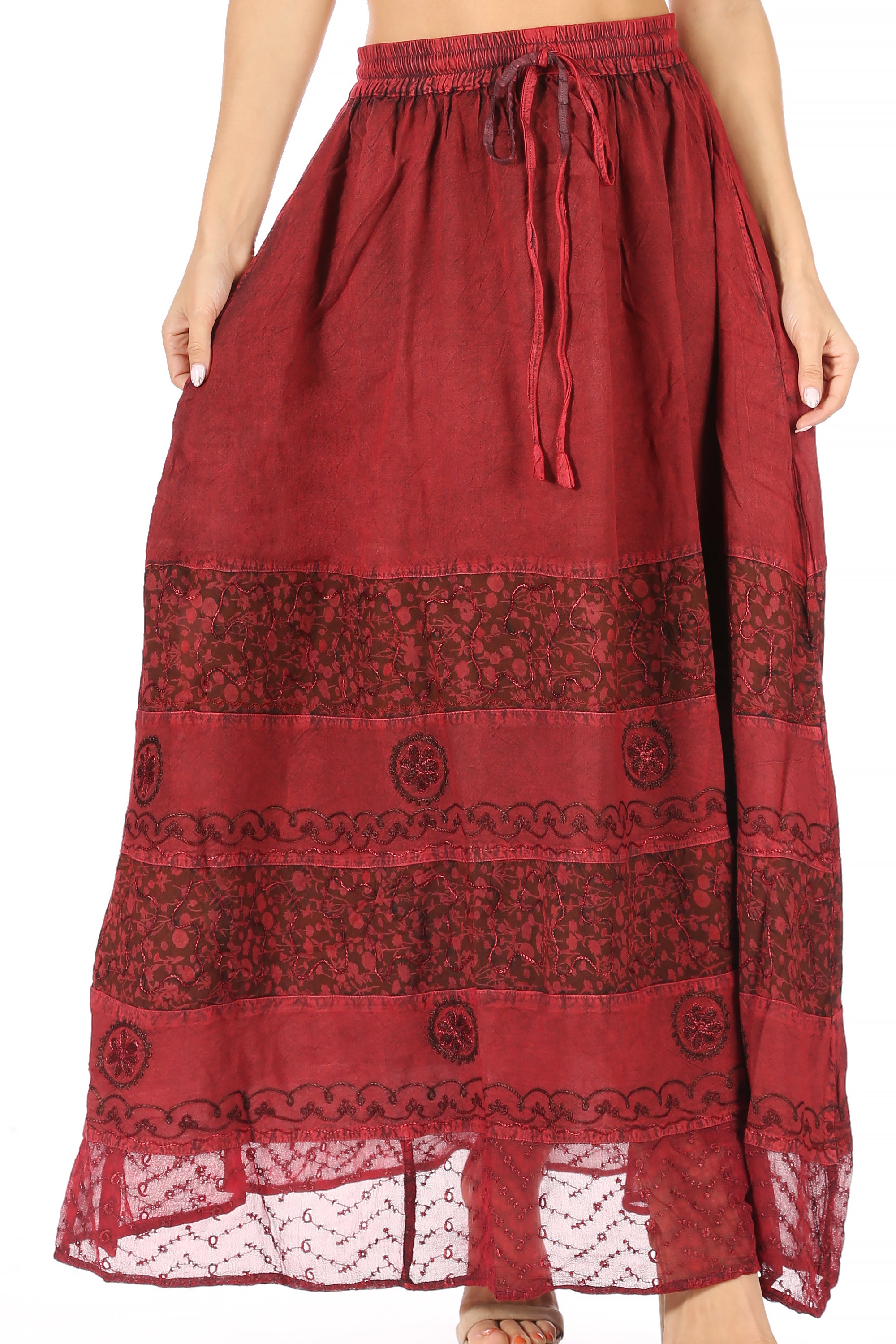 Red patterned skirt with lace hem on a white background