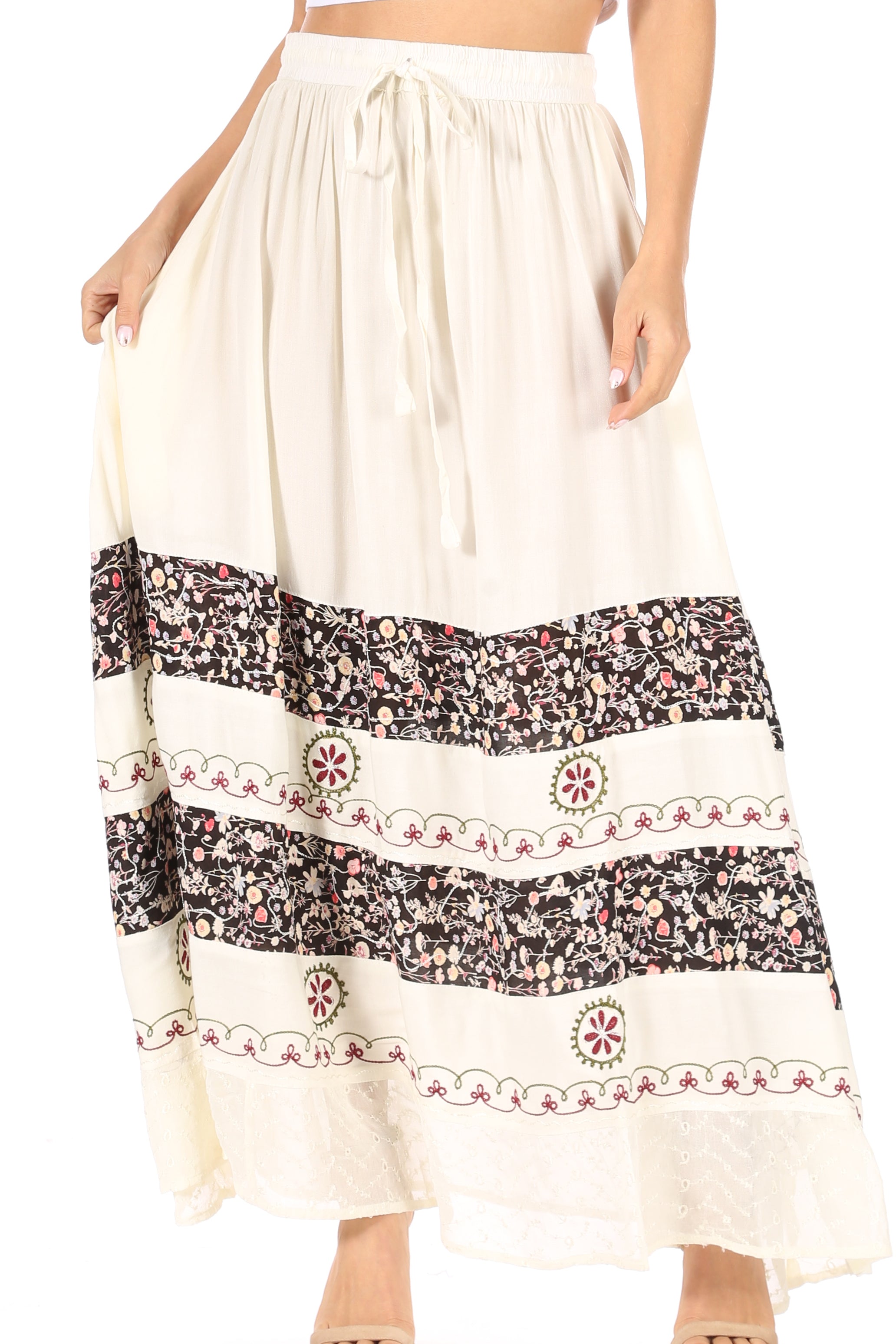 Long cream skirt with black and red patterned hem
