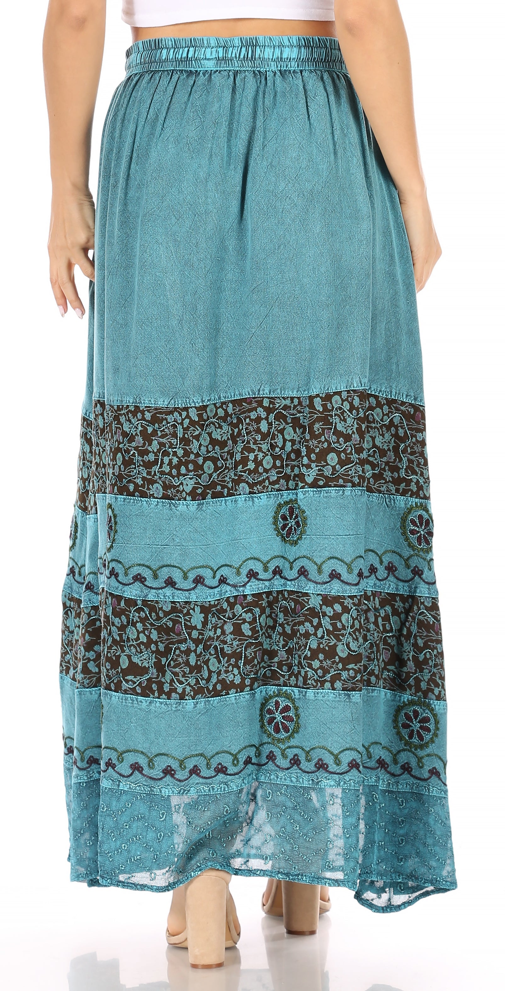 Teal maxi skirt with lace details on a white background