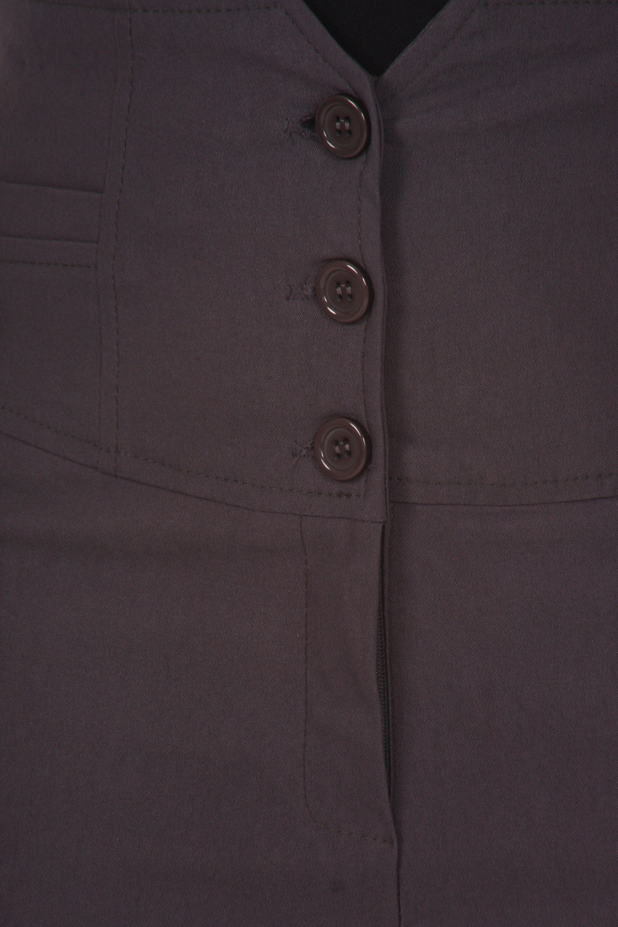 Close-up of a gray jacket with buttons on a plain background