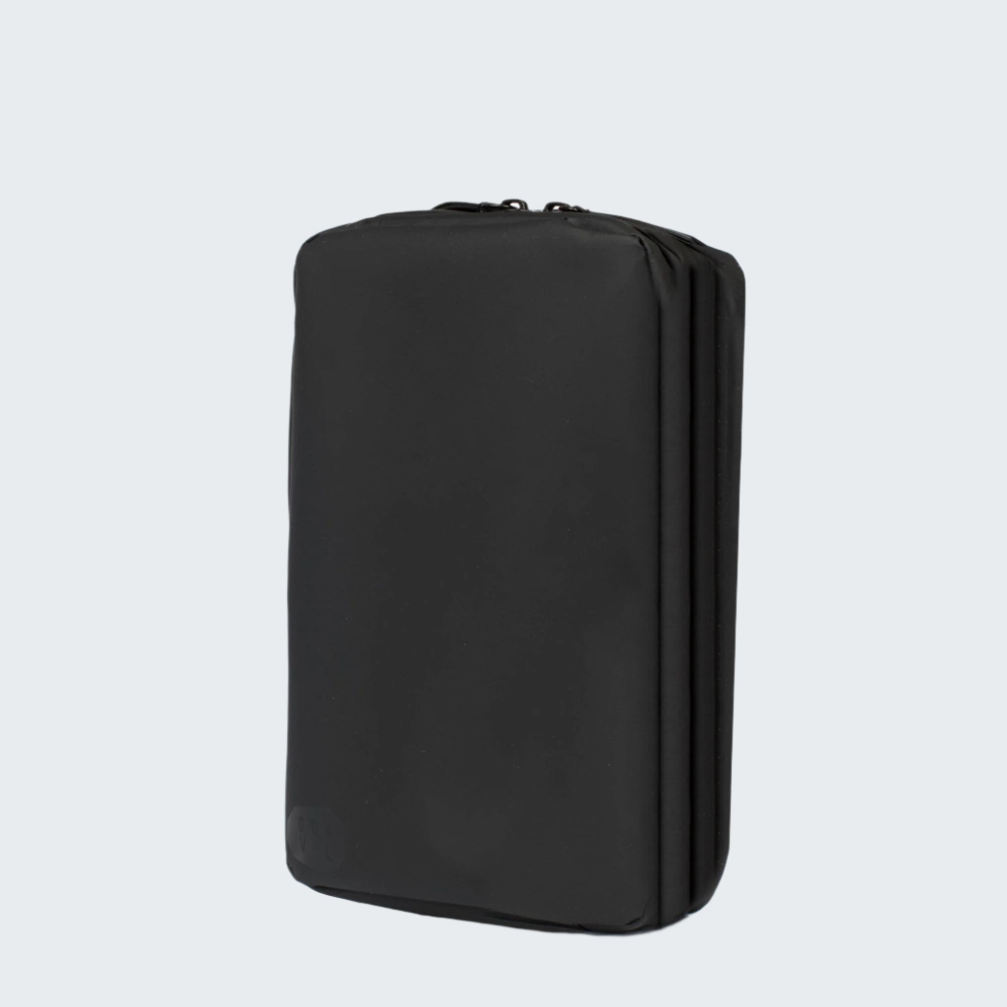 Black travel pouch on a white background