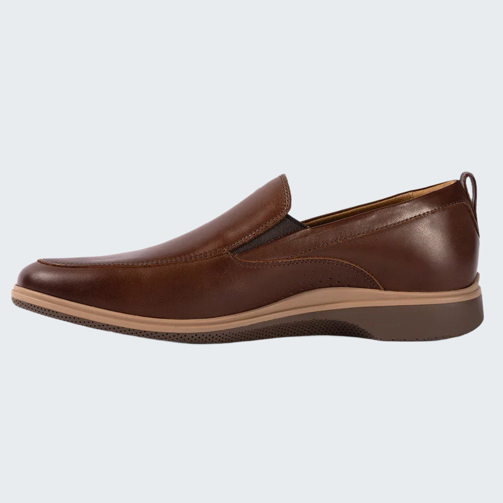 Brown leather loafer shoe on a white background