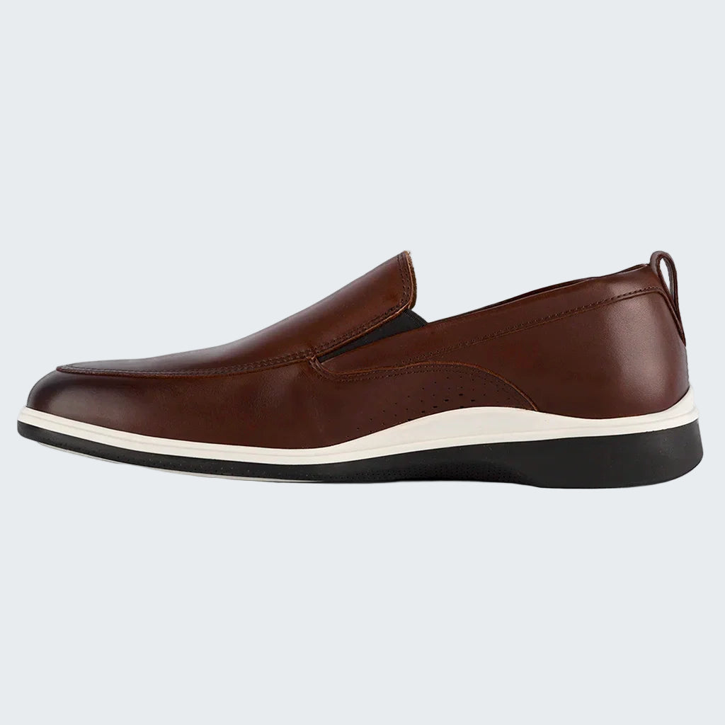 Brown loafer shoe on a white background