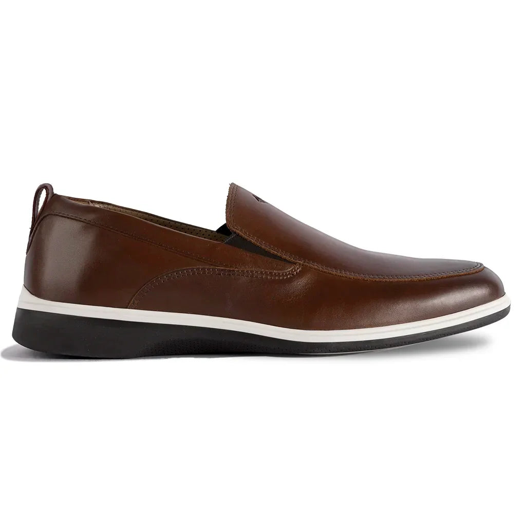 Brown loafer shoe with a white sole on a white background