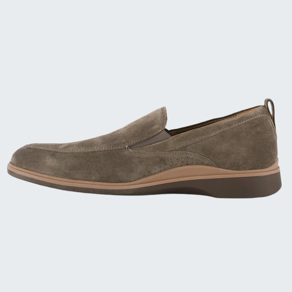 Brown suede loafer shoe on a white background