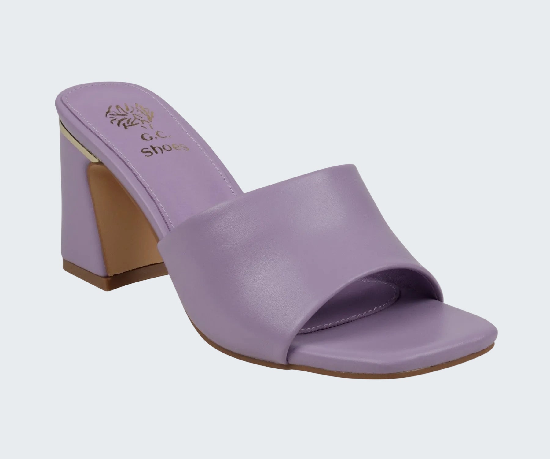 Purple sandal with a brown heel on a white background