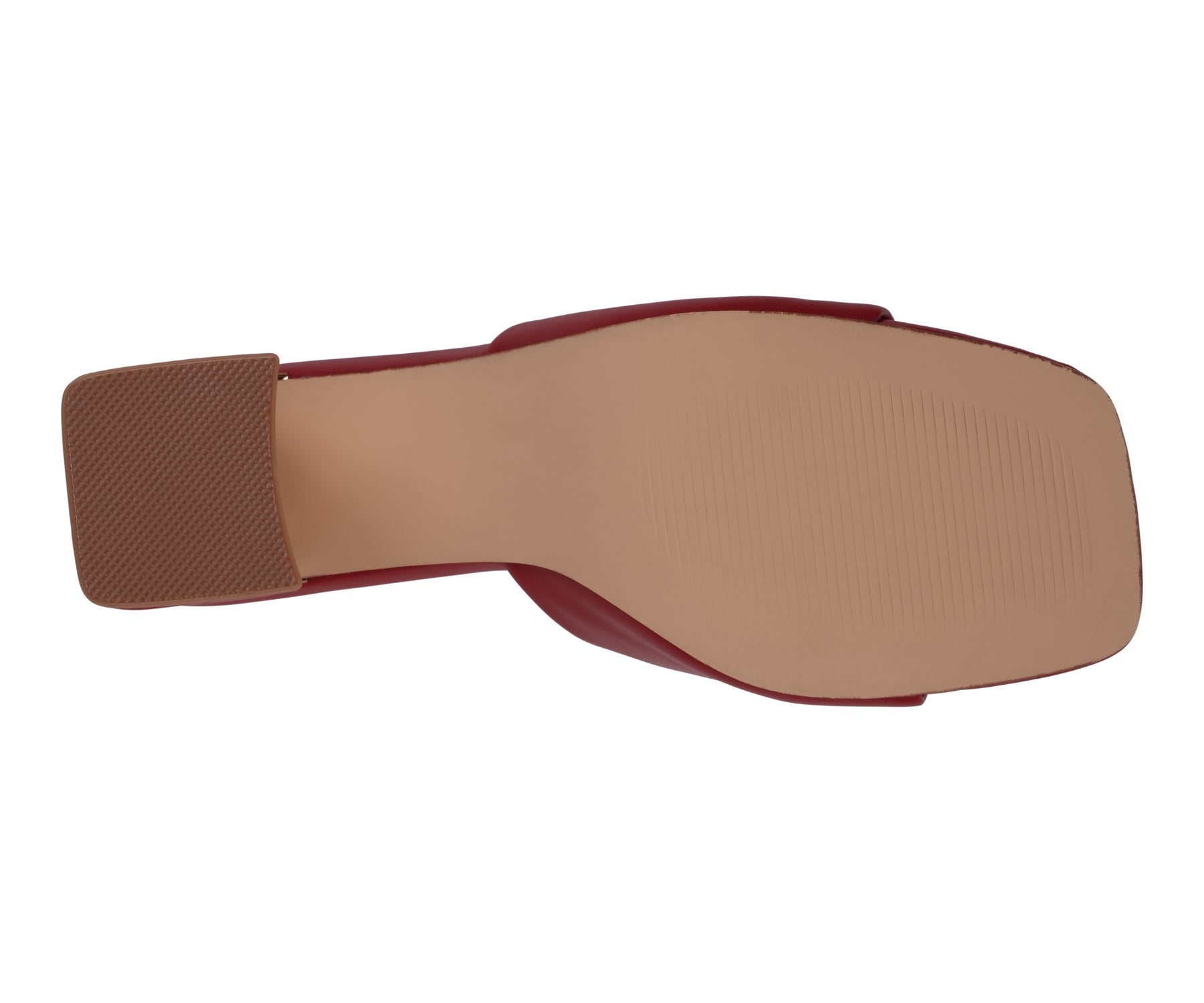 Close-up of a shoe sole with brown insole on a white background