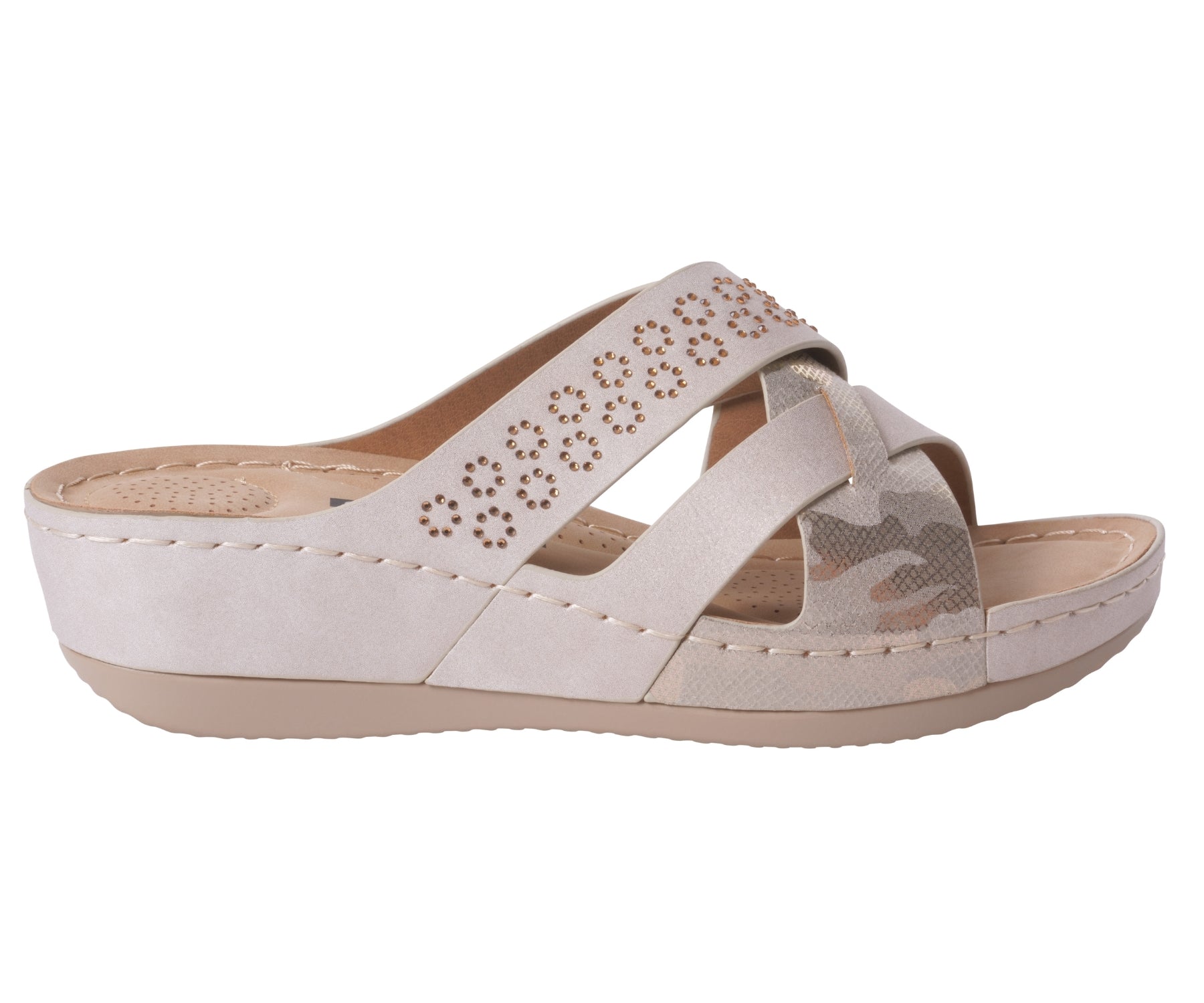 Beige sandal with criss-cross straps on a white background