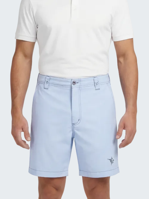 Person wearing light blue shorts and a white polo shirt on a white background