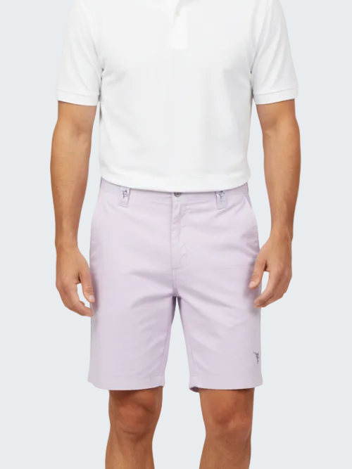 Person wearing light purple shorts and a white polo shirt on a white background